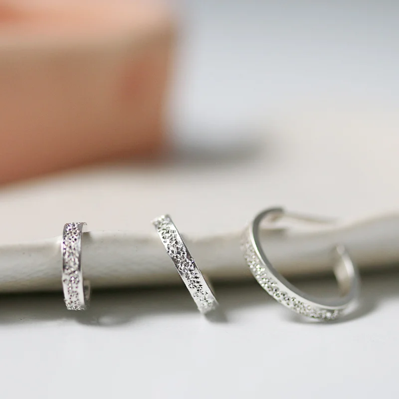 Women’s cubic zirconia earrings-BOLD HUGGIE HOOPS  | DIAMOND DUSTED