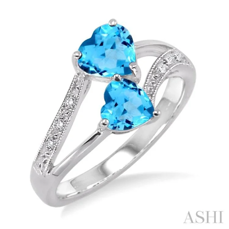 Women’s platinum engagement rings-5&6 mm Heart Shape Blue Topaz and 1/50 Ctw Single Cut Diamond Ring in Sterling Silver