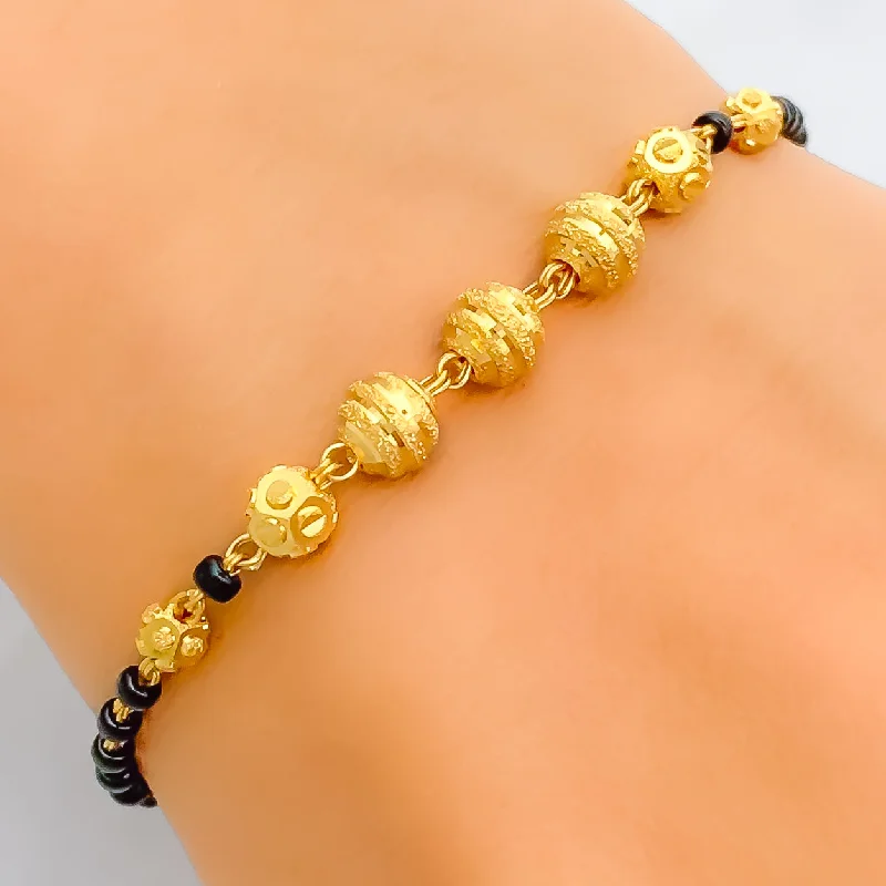 Women’s bangle bracelets-Iconic Striped 22k Gold Black Bead Bracelet