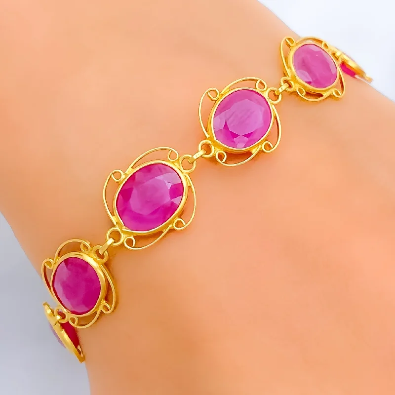 Women’s friendship bracelets-Vibrant Oval Ruby Motif 22k Gold Bracelet