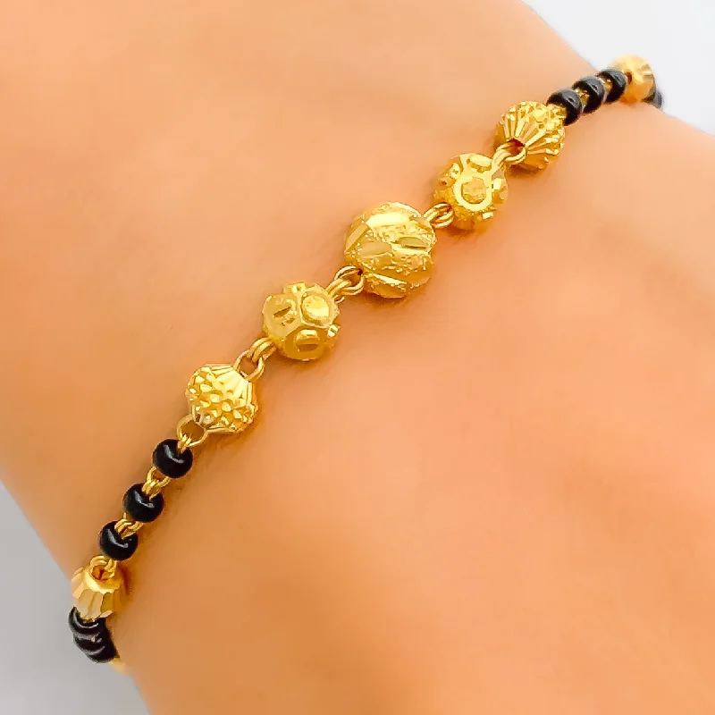 Women’s minimalist bracelets-Graduating Five Bead 22k Gold Black Bead Bracelet