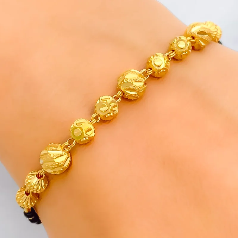 Women’s handmade bracelets-Jazzy Engraved 22k Gold Black Bead Bracelet