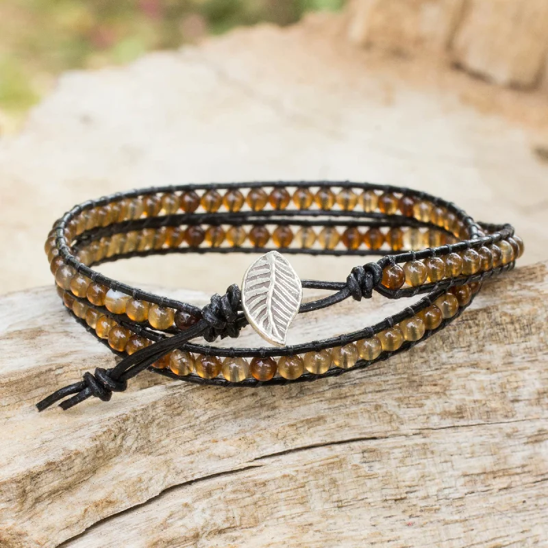 Women’s gold tennis bracelets-Hill Tribe Sun Handcrafted Thai Black Leather Bracelet with Golden Agate