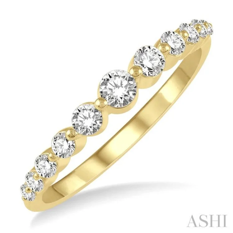 Women’s engagement rings with rose gold accents-1/3 Ctw Graduated Round Cut Diamond Fashion Ring in 14K Yellow Gold