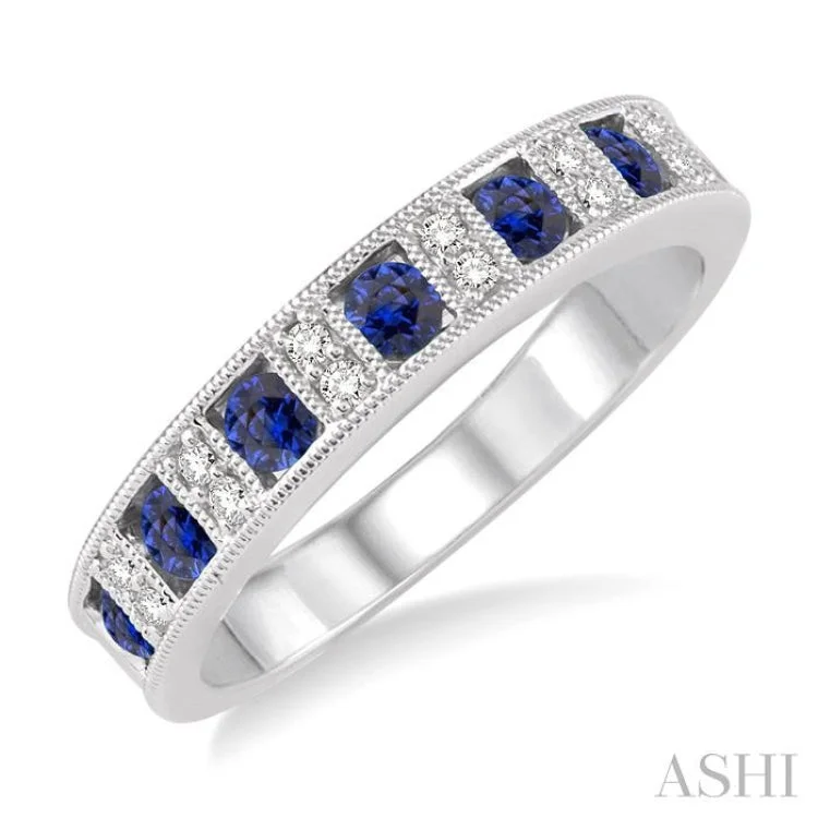 Women’s white gold engagement rings-2.5 mm Round Cut Sapphire and 1/10 Ctw Round Cut Diamond Band in 14K White Gold