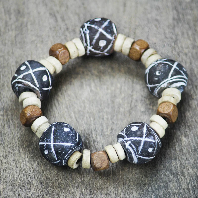 Women’s tennis bracelets-Dreams at Dusk Terracotta and Sese Wood Beaded Stretch Bracelet from Ghana