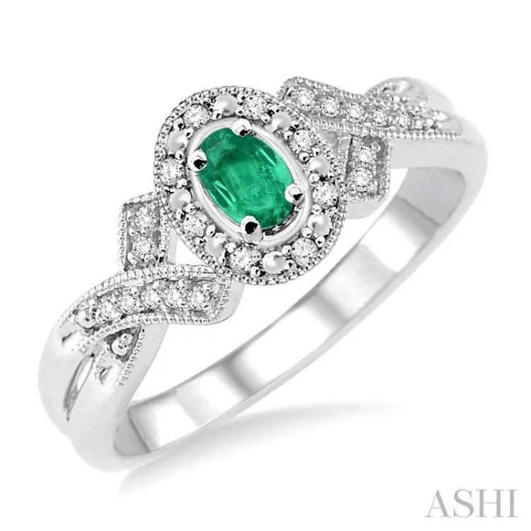 Women’s bold engagement rings-5x3 mm Oval Cut Emerald and 1/50 Ctw Single Cut Diamond Ring in Sterling Silver