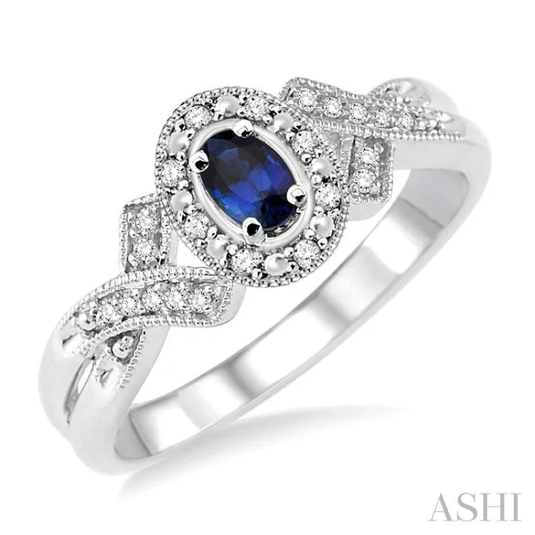 Women’s two-tone engagement rings-5x3 mm Oval Cut Sapphire and 1/50 Ctw Single Cut Diamond Ring in Sterling Silver