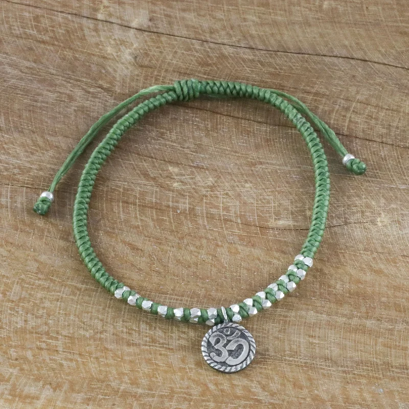 Women’s leather bracelets-Ancient Om in Green Silver Om Charm Bracelet on Braided Green Cords