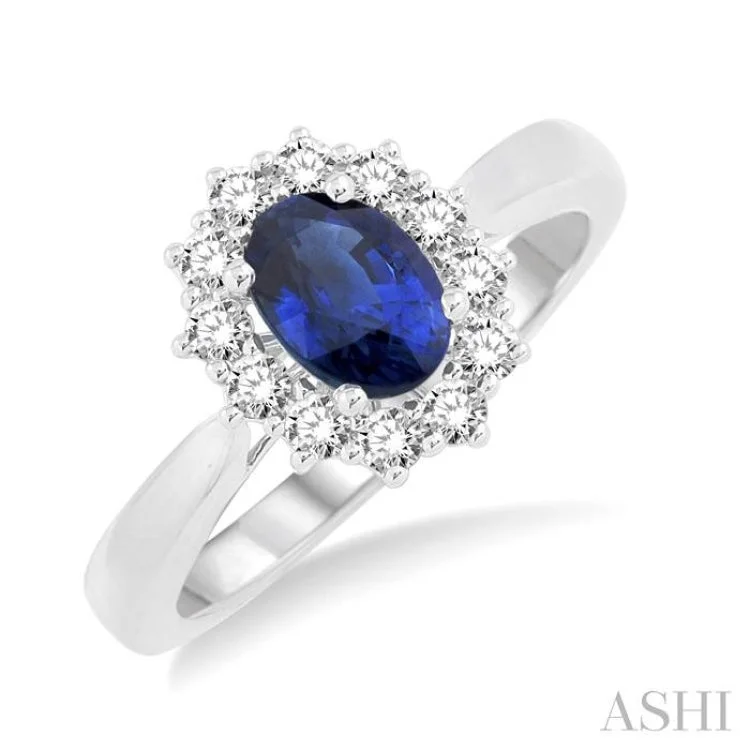 Women’s wedding and engagement rings-7X5mm Oval Shape Sapphire and 1/3 Ctw Round Cut Diamond Ring in 14K White Gold