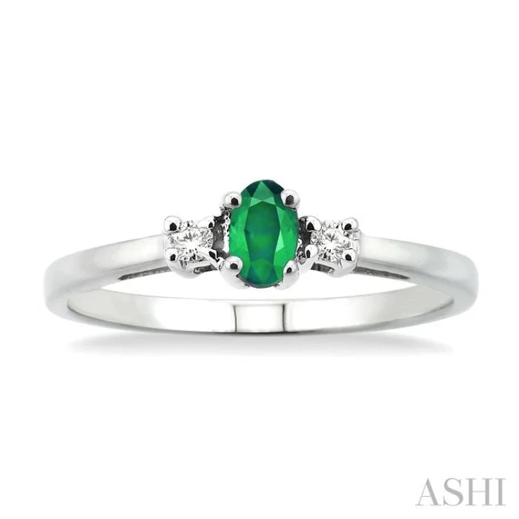 Women’s timeless engagement rings-5x3mm Oval Cut Emerald and 1/20 Ctw Round Cut Diamond Ring in 10K White Gold