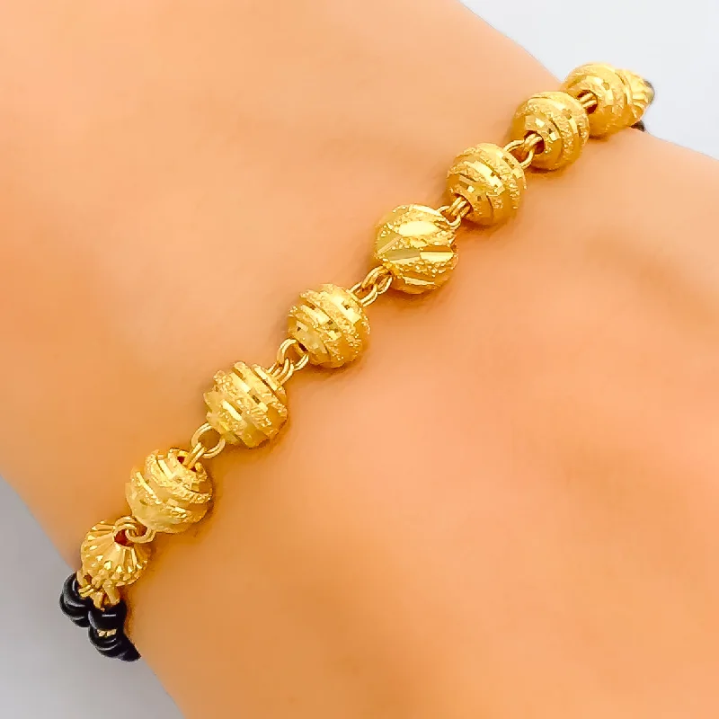 Women’s boho bracelets-Majestic Multi-Orb 22k Gold Black Bead Bracelet